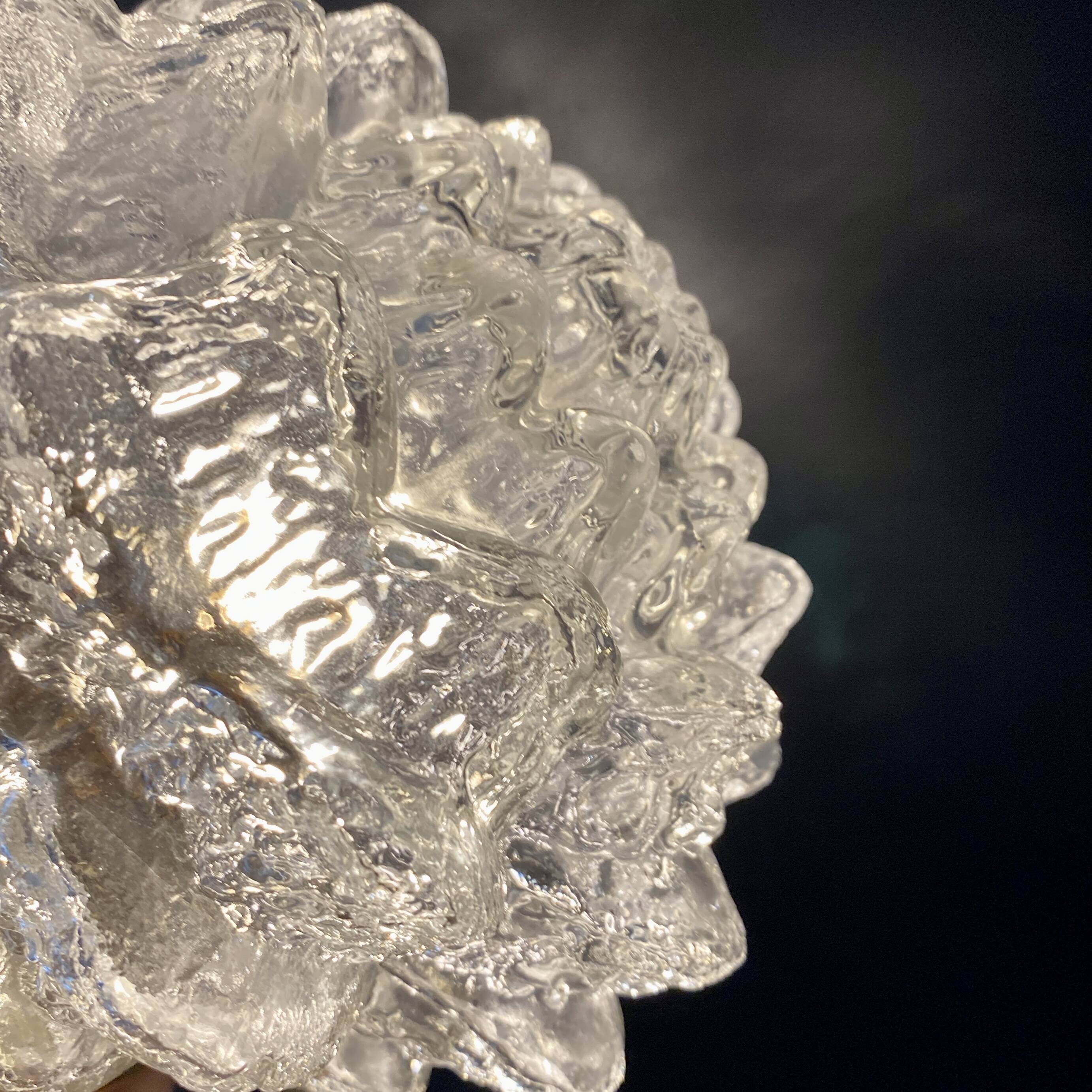 Vintage globe wall or ceiling light in molded glass in the shape of a flower