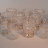 Service of 14 gold-plated and engraved glasses with a deer in the woods design from 1950