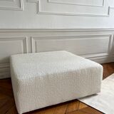 Square ottoman and its cushions in buckle fabric