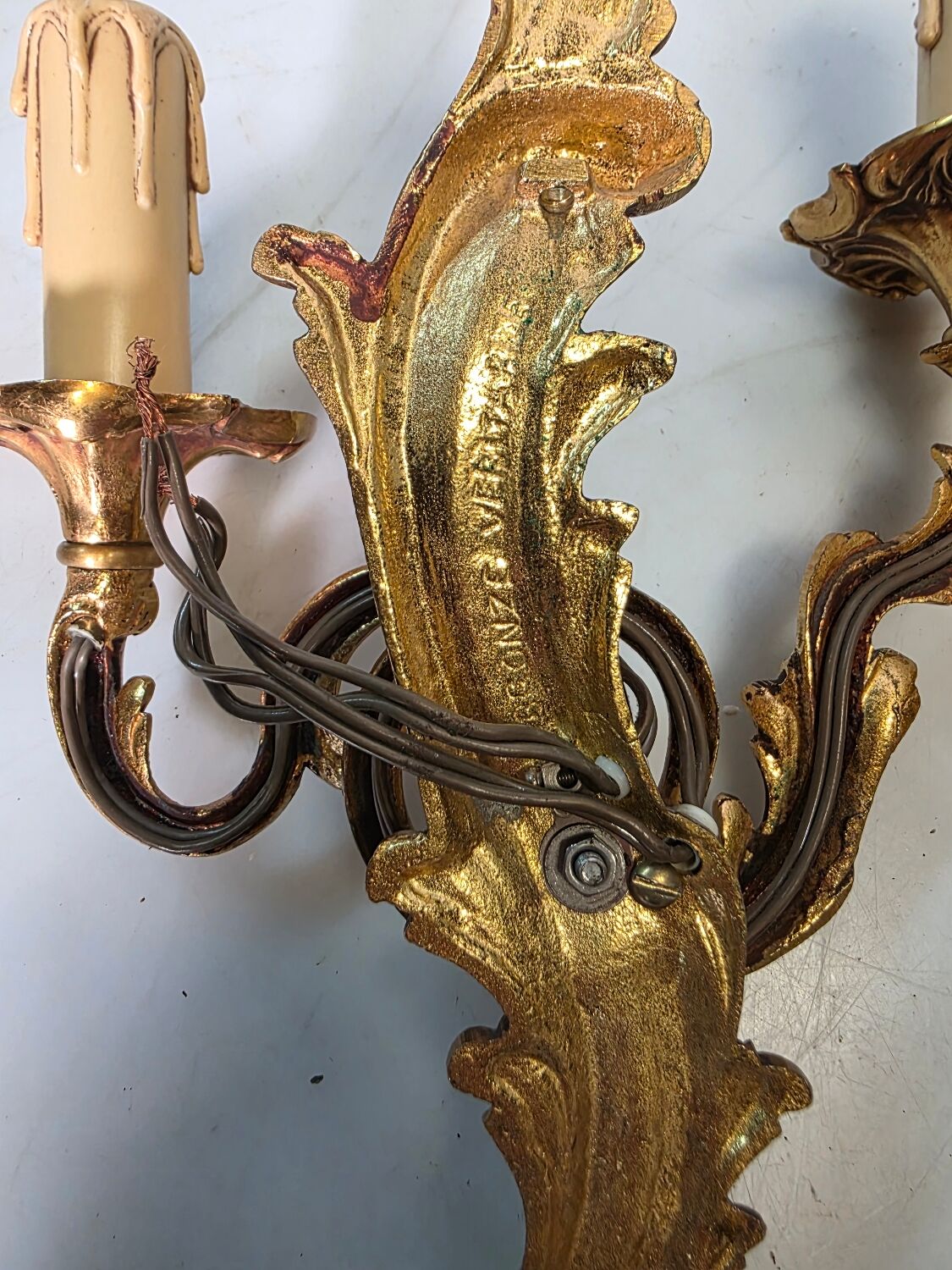 Pair of Louis XV style bronze wall sconces