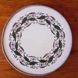 Porcelain and zinc trivet circa 1900