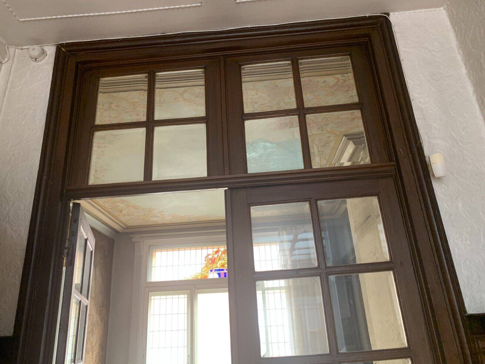 Double separation doors with transom and beveled glass 20th century