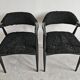 Pair of Mid Century Modern armchairs in astrakhan leather.