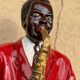 Large black and red jazz figurine in fibreglass, decorative sculpture from the 1960s.