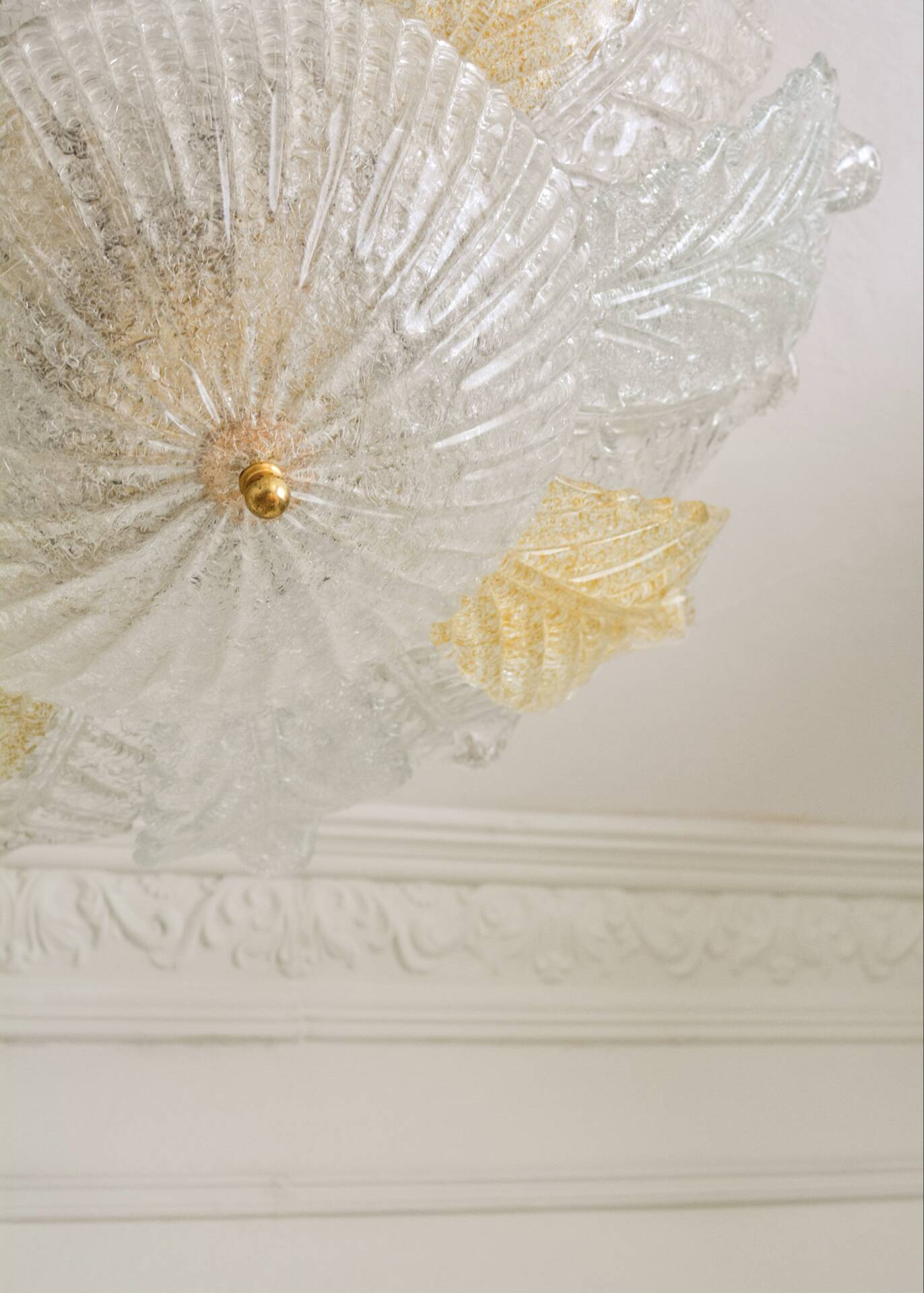 Vintage Murano chandelier/ceiling light with 16 white and amber leaves.