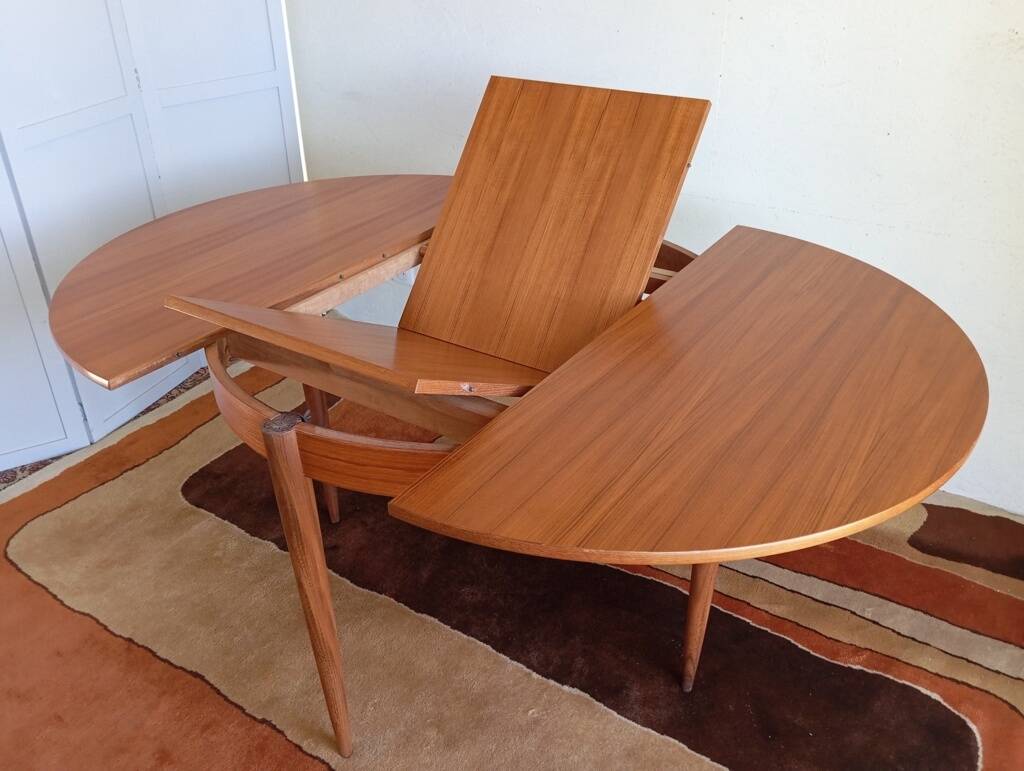 Scandinavian round extendable teak table