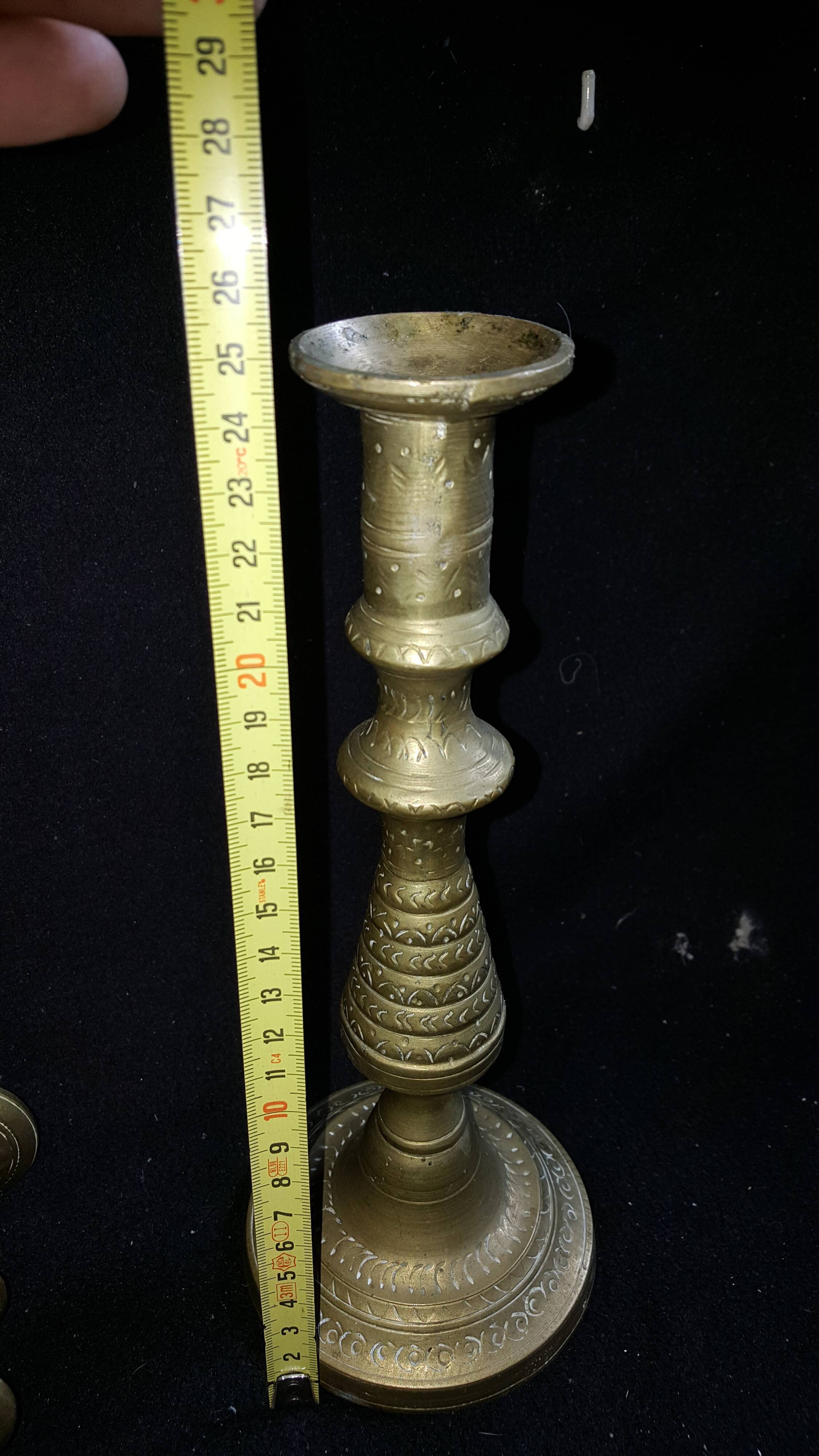 Former pair of bronze candlesticks