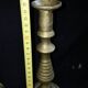 Former pair of bronze candlesticks