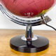 Bright globe vintage red background