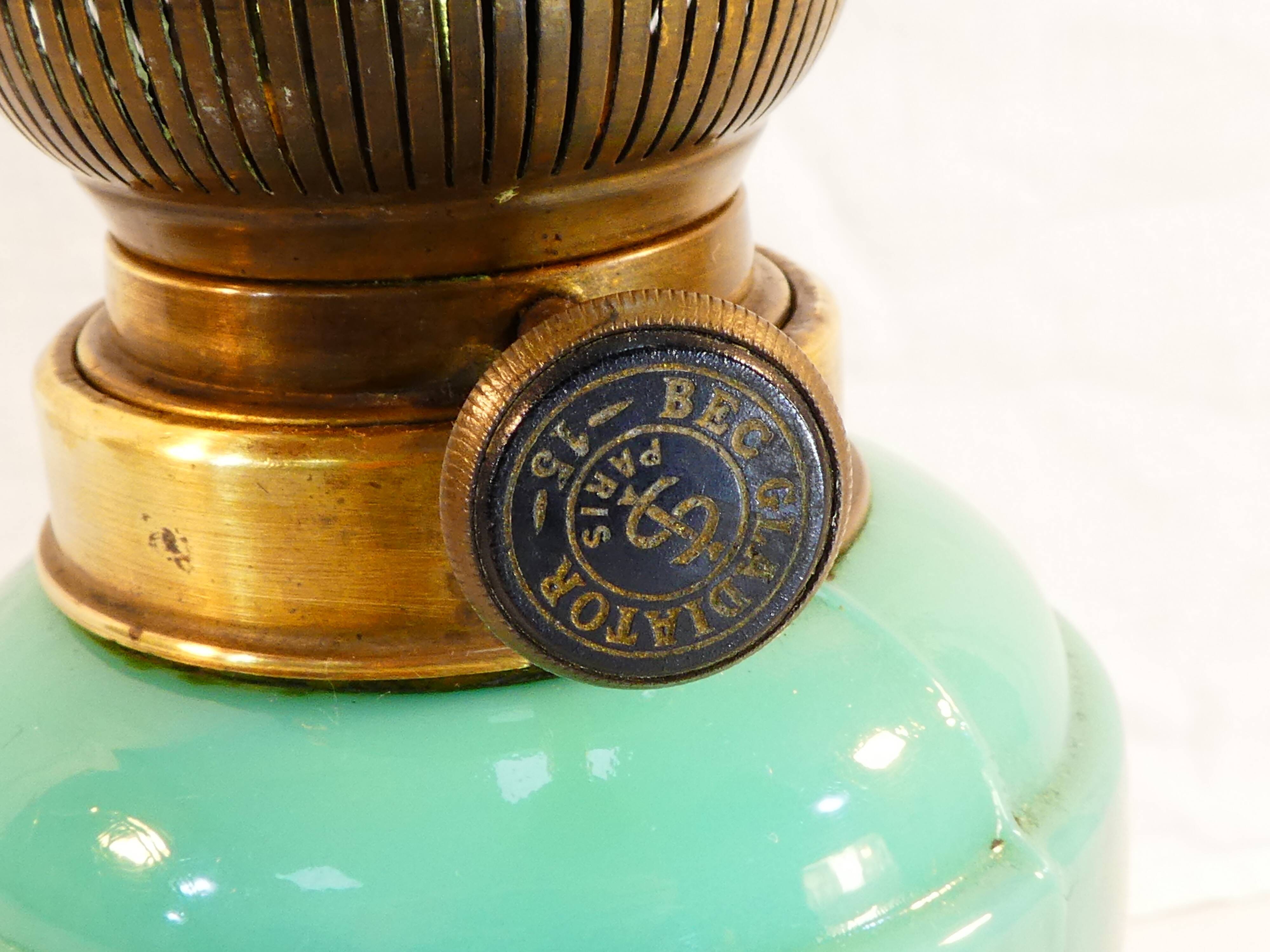 Ancient lampe a petrole in green opaline