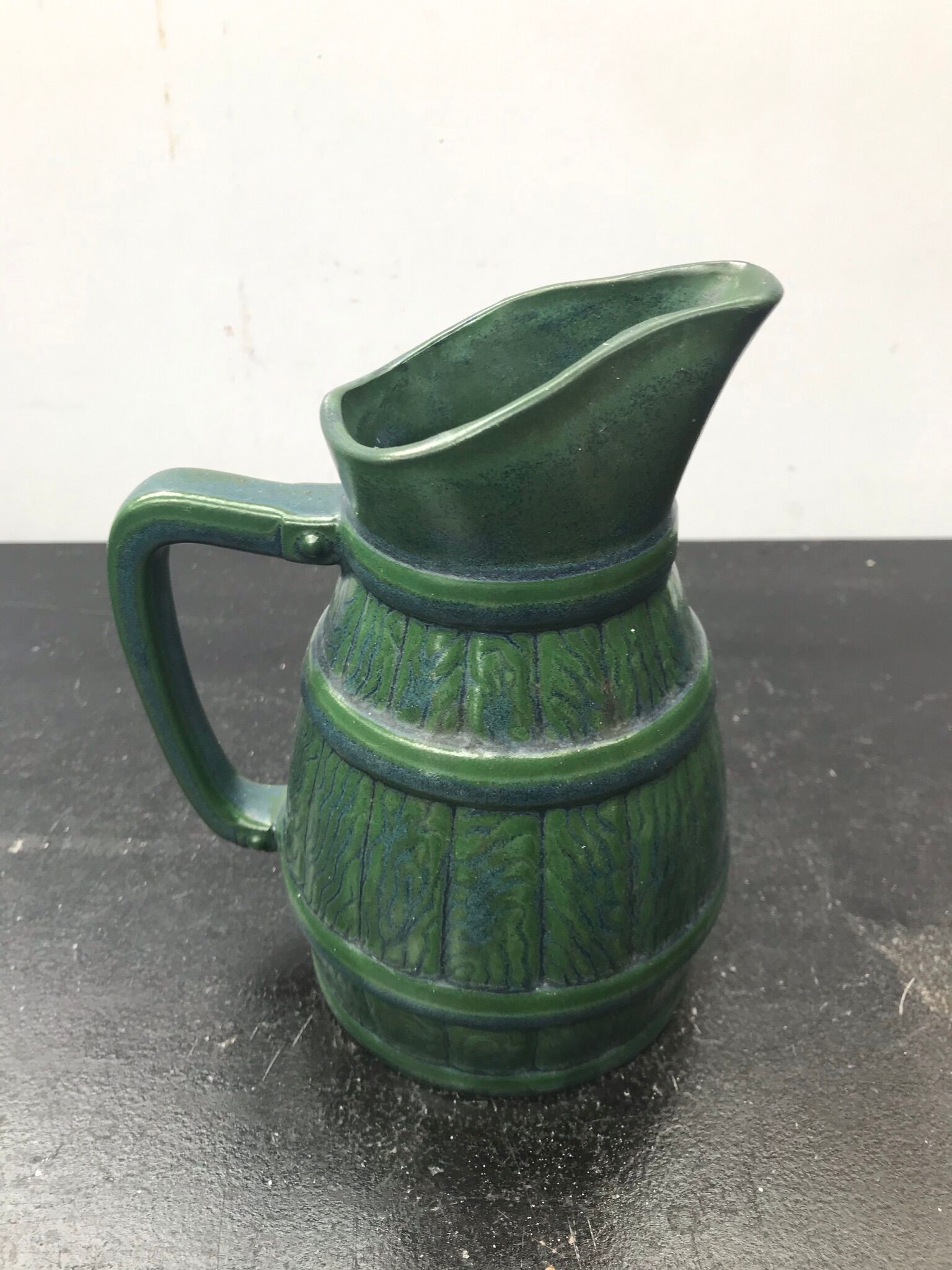 Former green ceramic pitcher shape tonneau