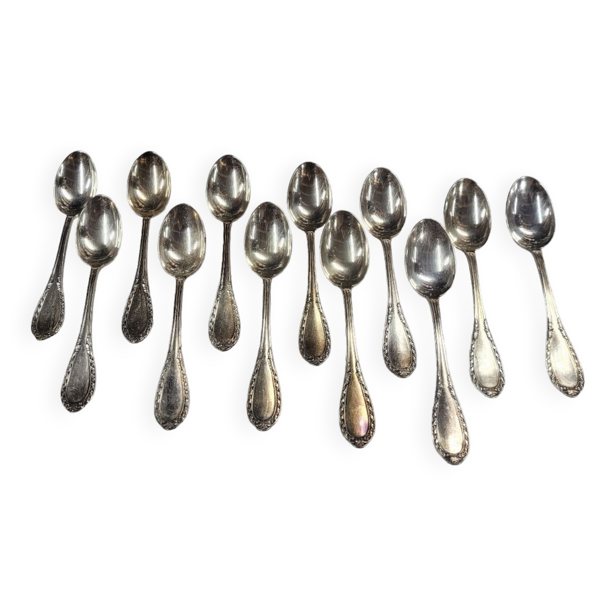Lot de 12 cuillères du milieu XXème en métal argenté