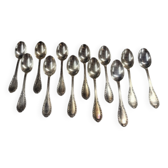 Set of 12 spoons of the middle twentieth in silver metal