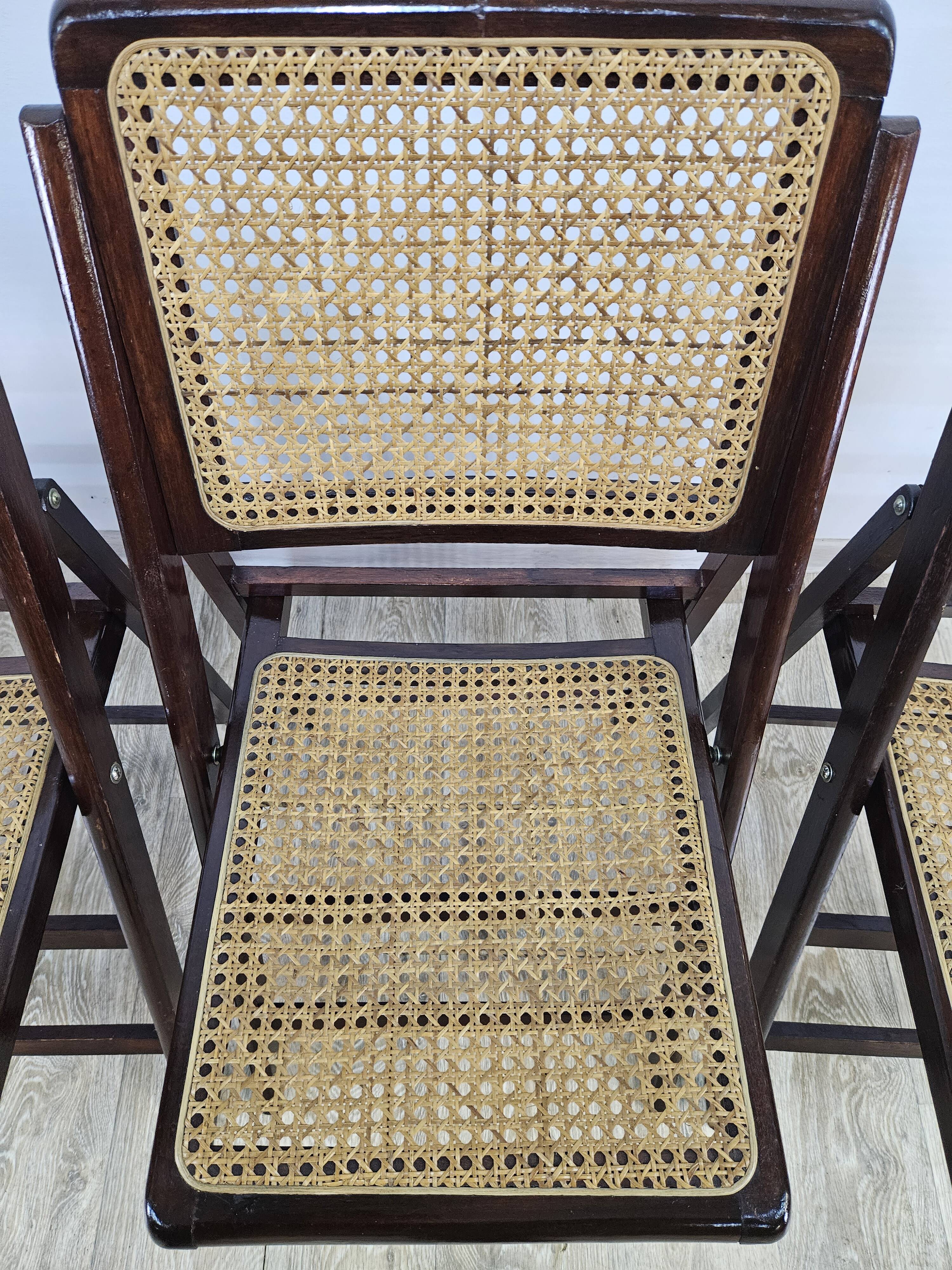 Folding wooden chairs with raffia, 1970s.