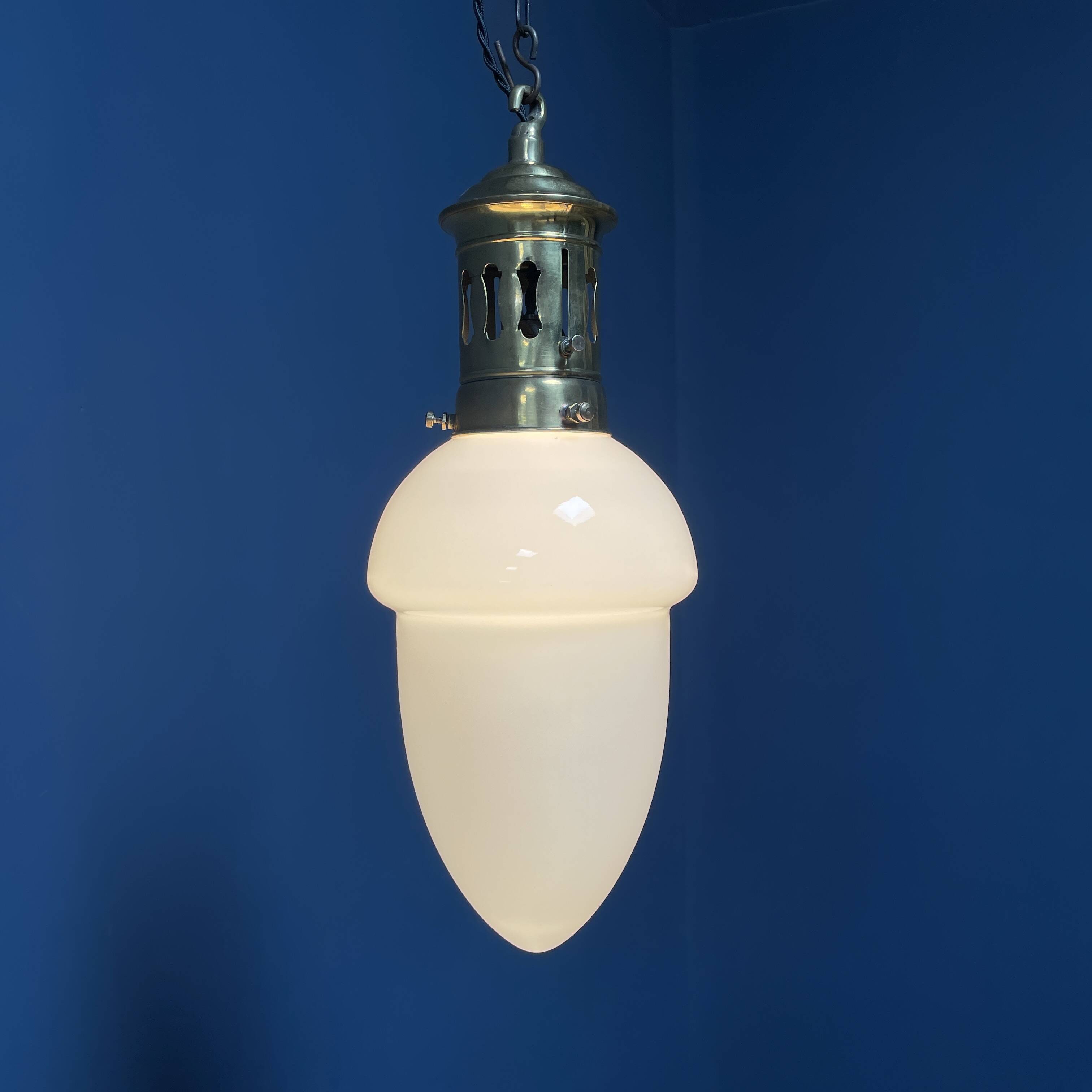 Opaline glass pendant lamp with elegant brass fixture