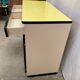 Yellow formica sideboard