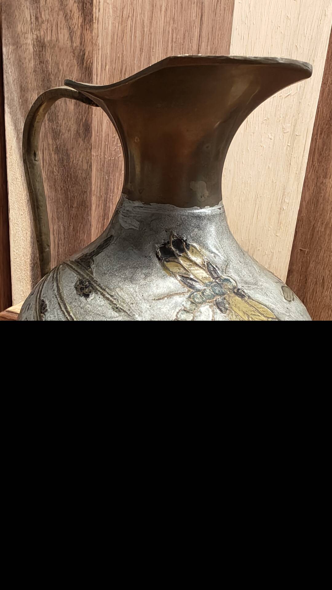 I am selling this very pretty jug/decorative vase in an artisanal style.