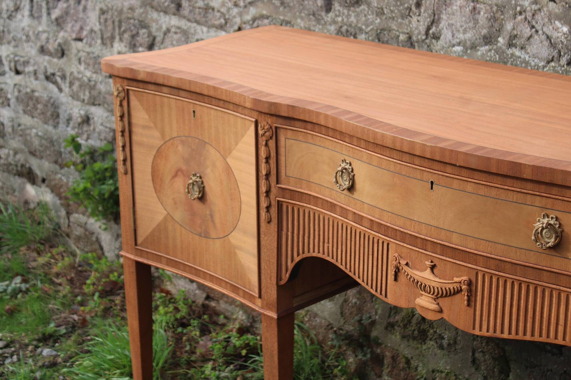 English-made enfilade in Louis XVI style with light wood veneers.