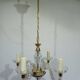 4-light glass and brass chandelier