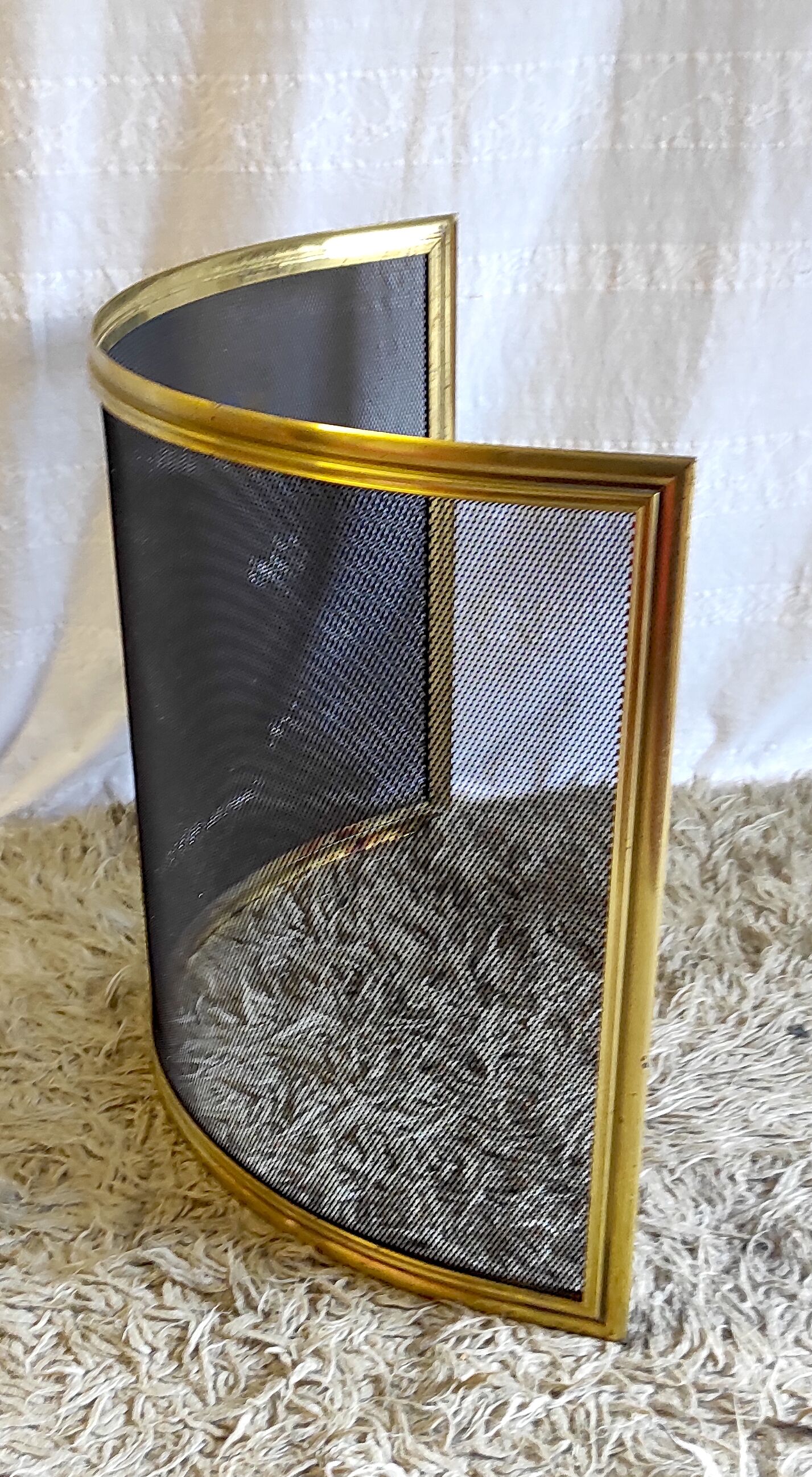 Brass bow firewall and metal mesh