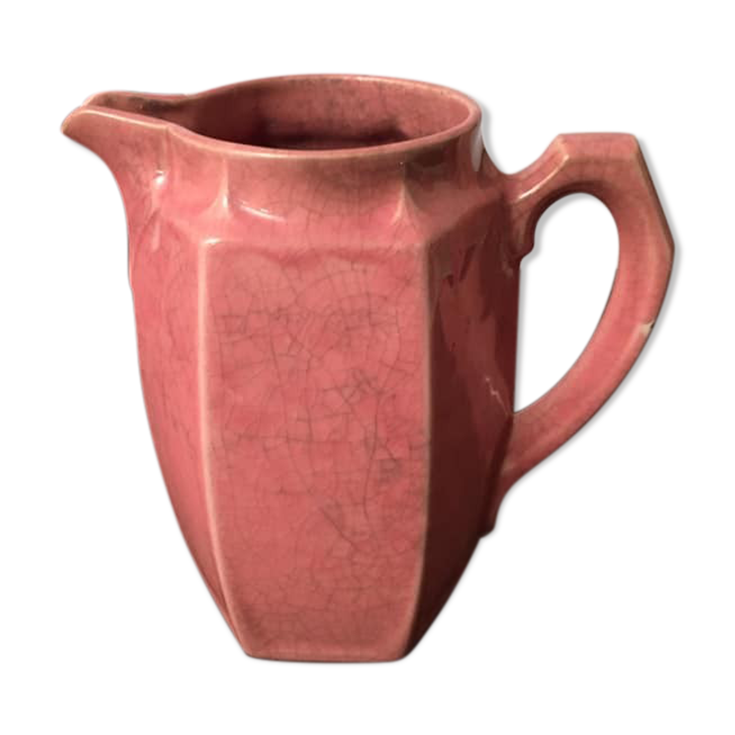 Old pitcher in earthenware of a very pretty pink