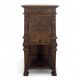 Renaissance-style cabinet in solid oak decorated with chimeras and caryatids