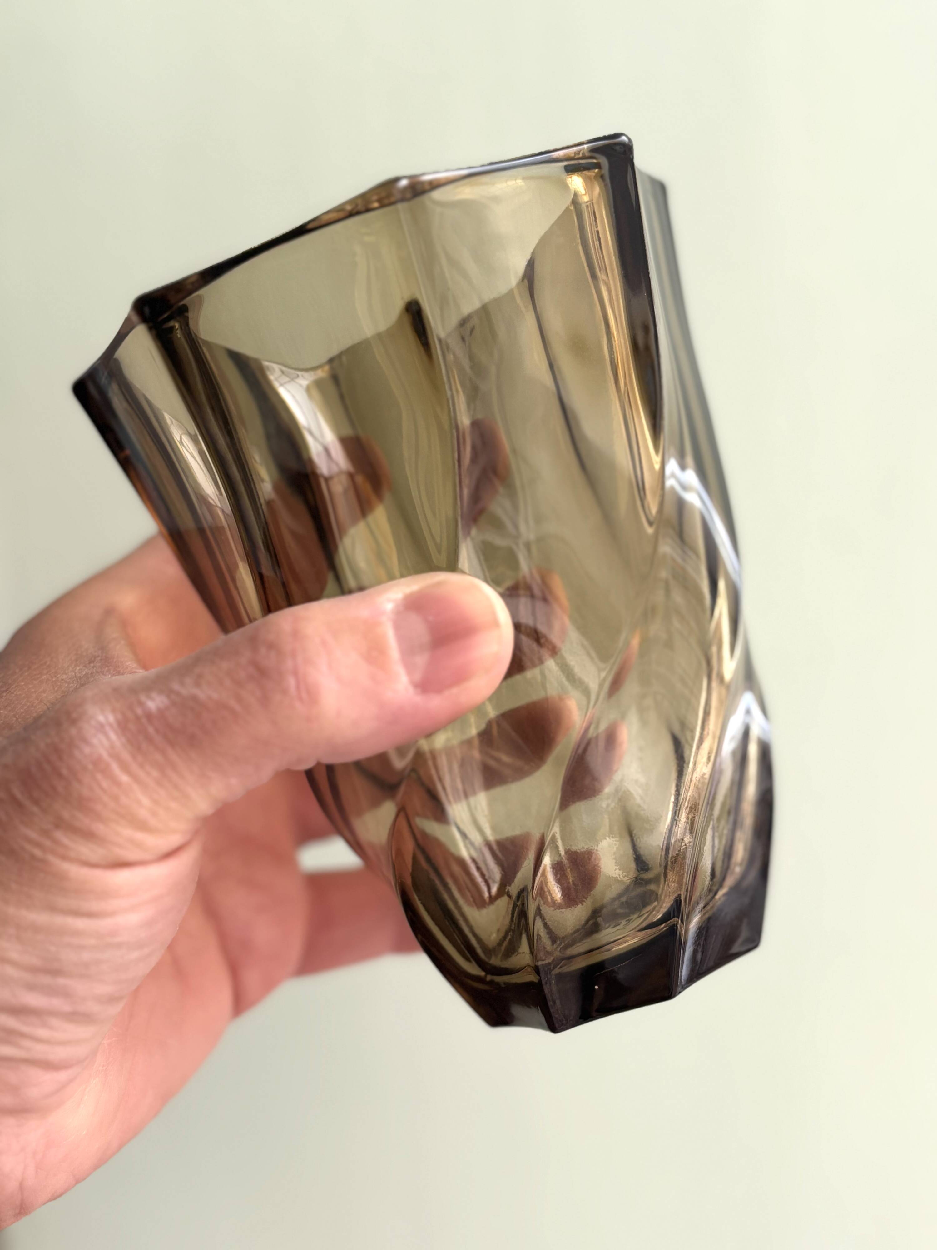 Small translucent dark brown twisted glass vase