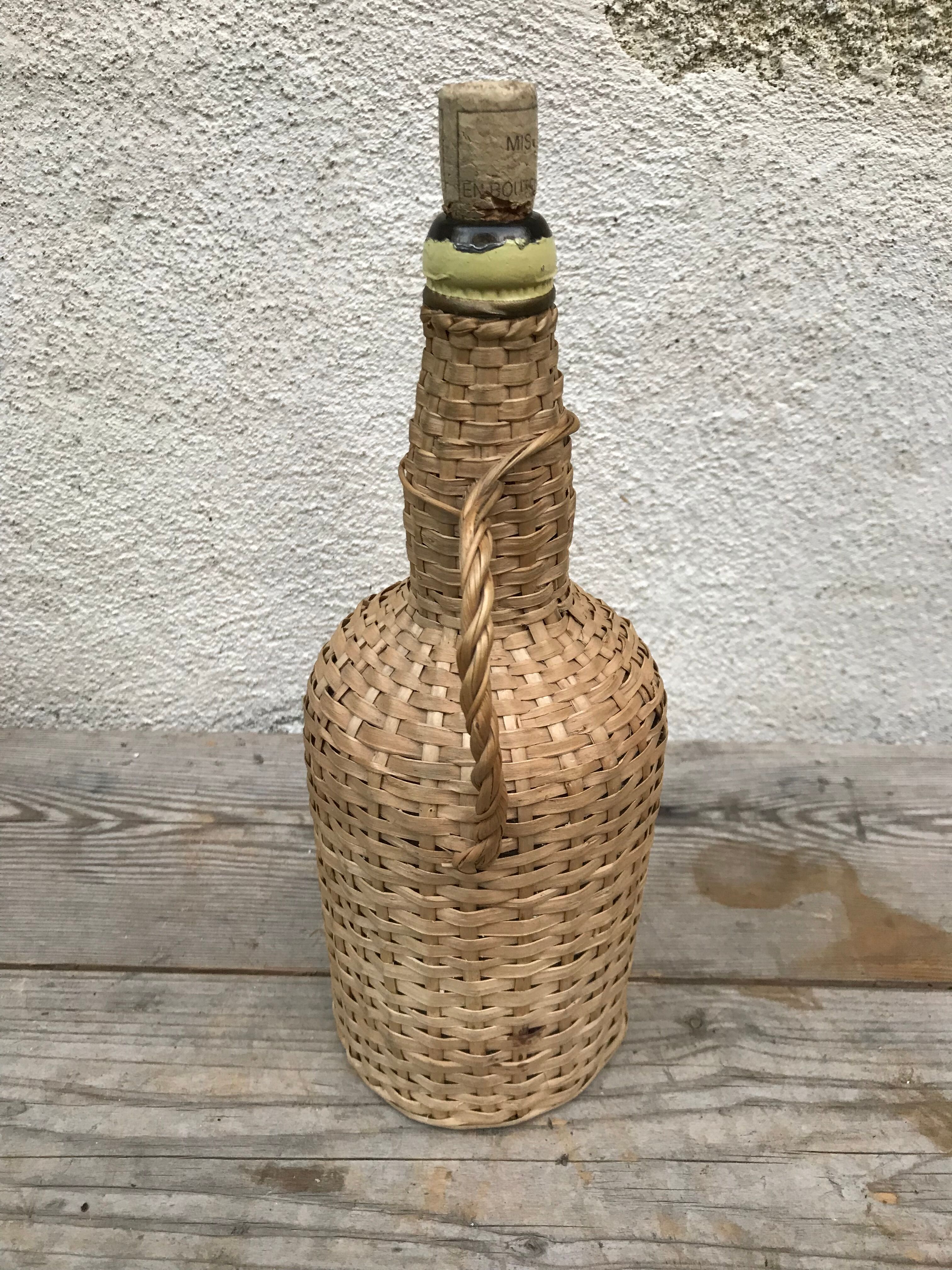 Bottle old woven wicker rattan