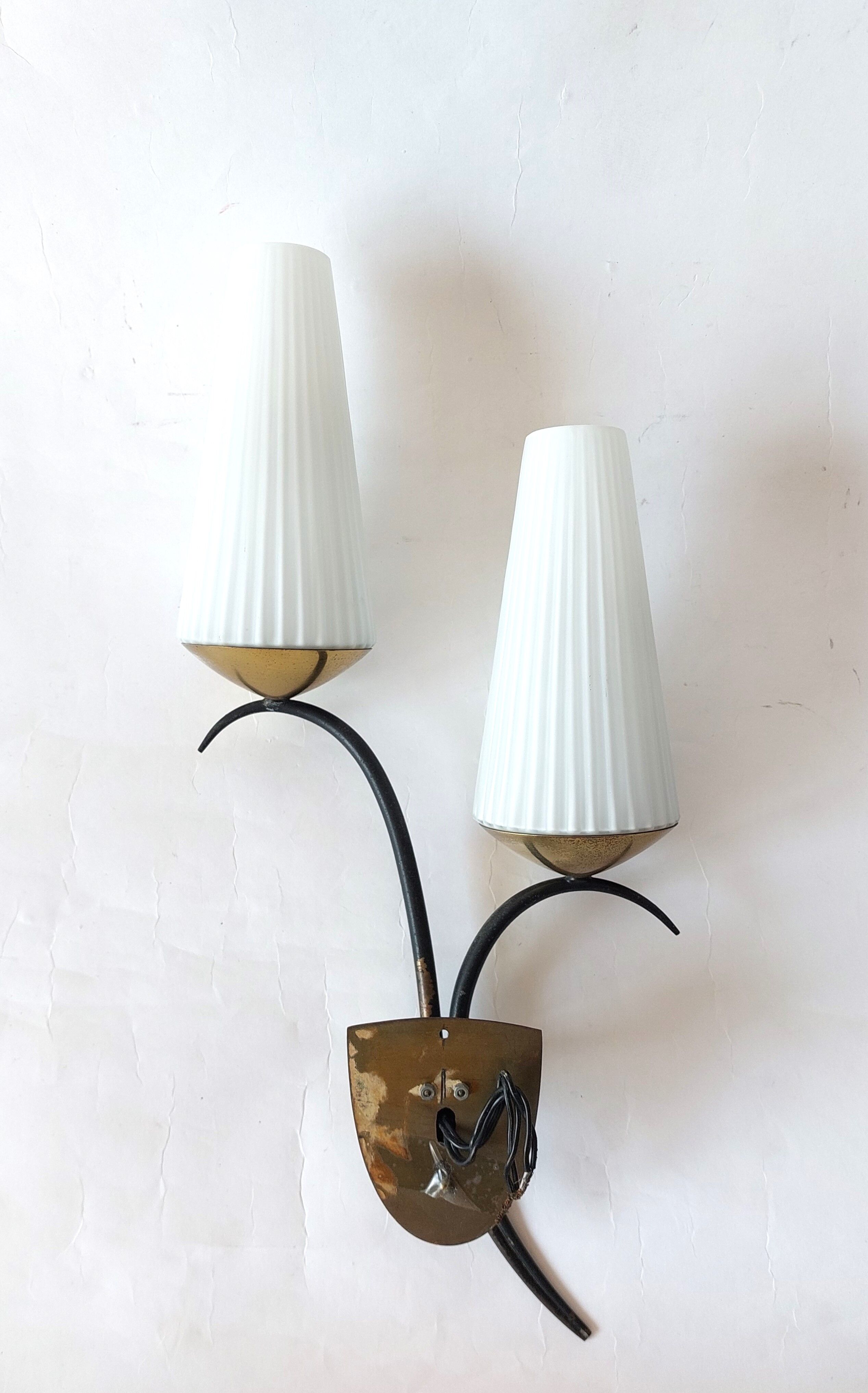 Wall lamp in black metal and gilded brass 1960 with two lights.