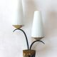 Wall lamp in black metal and gilded brass 1960 with two lights.