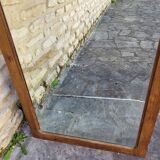 Art Deco oak mirror with bevelled glass from the 1930s.