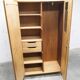 1950s Mid-Century Modern oak armoire with two doors and two drawers.