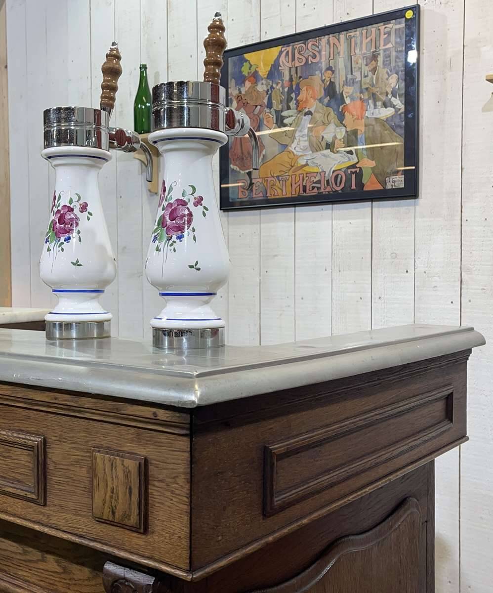 Bar counter in oak, zinc, and white marble from the early 20th century.