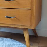 Vintage chest of drawers with tapered legs from the 1960s.