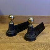 Pair of Napoleon III andirons from the 19th century in cast iron and brass