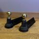 Pair of Napoleon III andirons from the 19th century in cast iron and brass