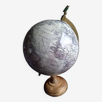 Terrestrial globe on wooden base