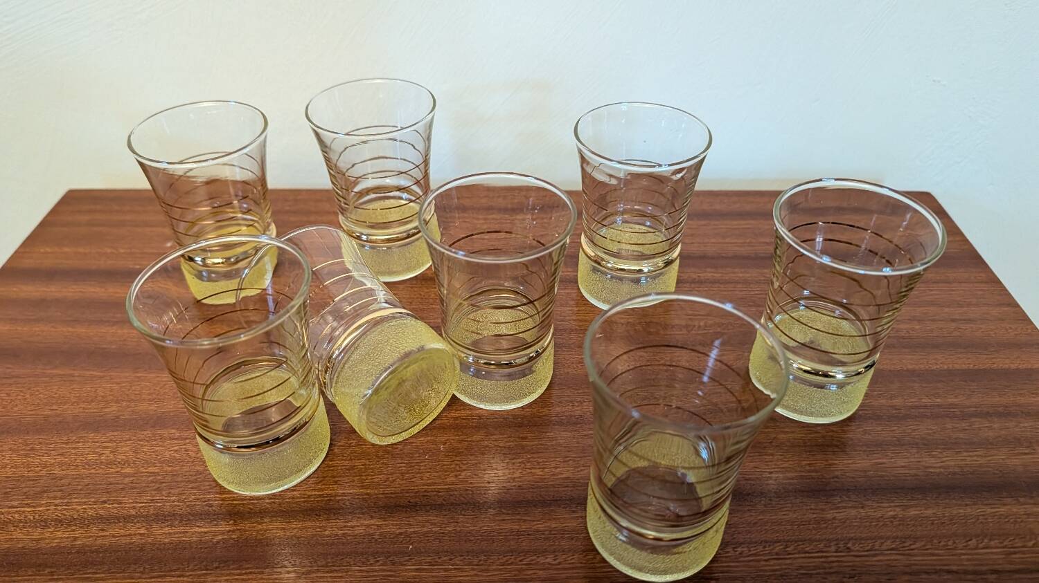 70s vintage glass with gold decoration and a speckled base.