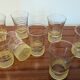 70s vintage glass with gold decoration and a speckled base.