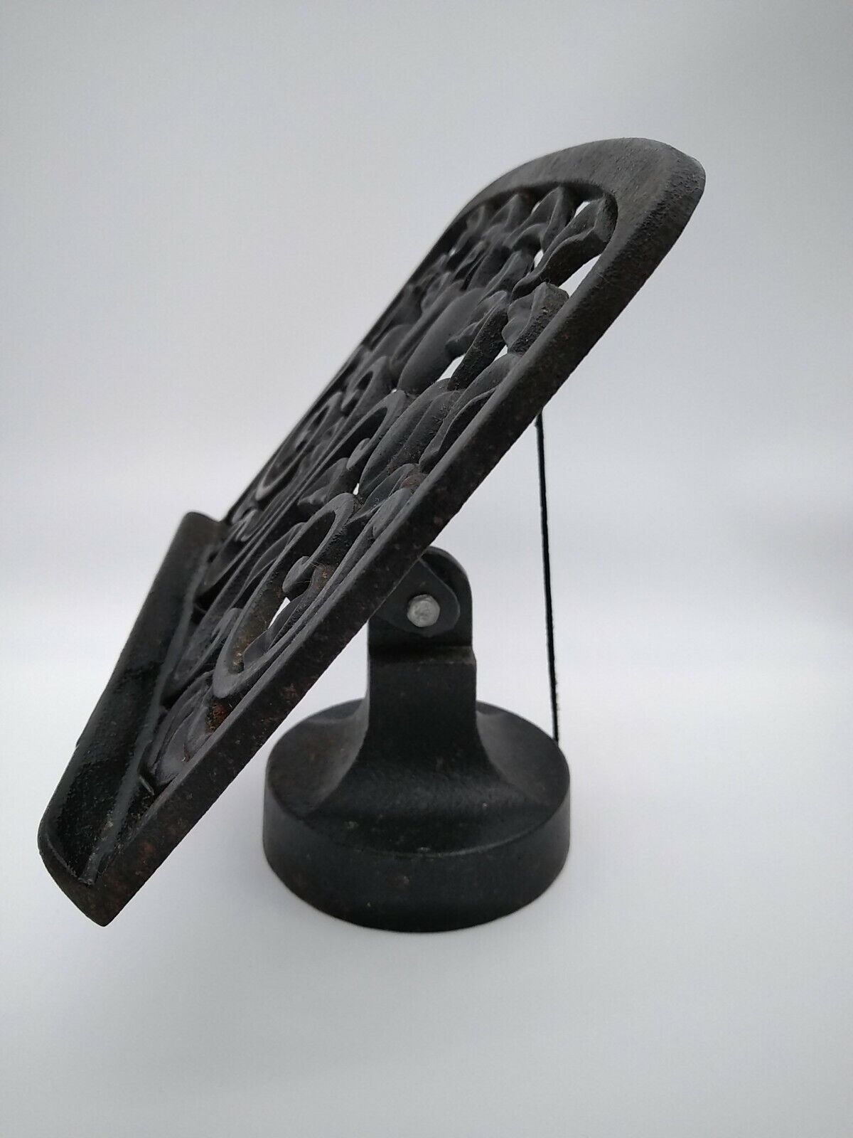 Cast iron lectern or lectrin with fruit decoration.