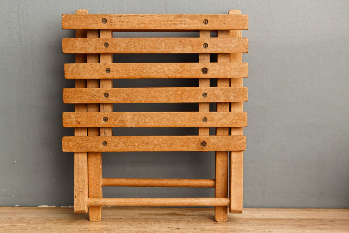 Lathy folding stool made of wood