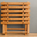 Lathy folding stool made of wood