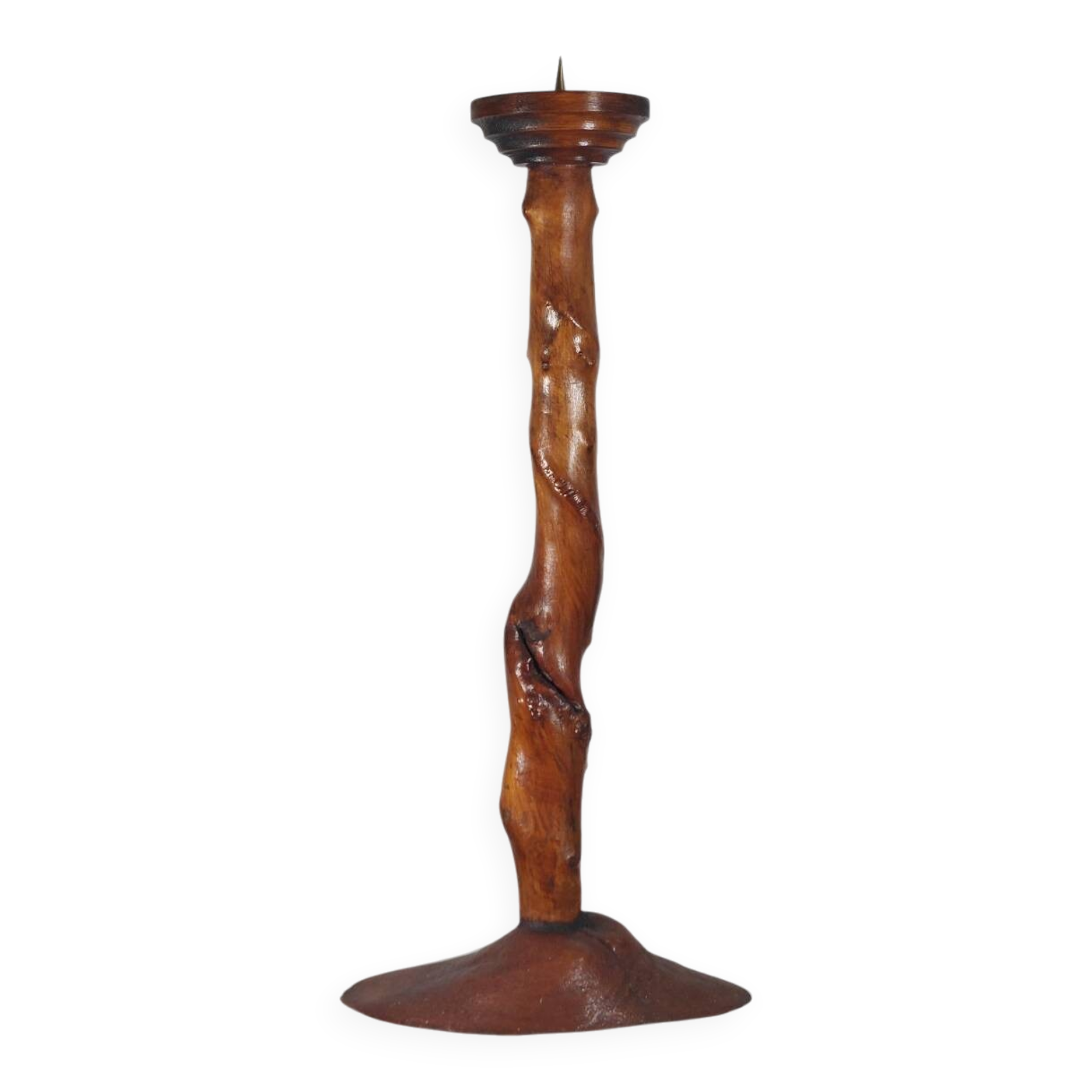 Vintage candle holder in an organic shape with a brass spike and tiered top.