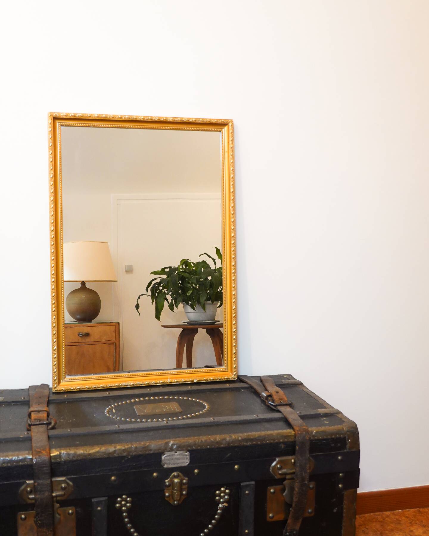 Vintage rectangular gilt mirror, molded wooden frame with beads and fire