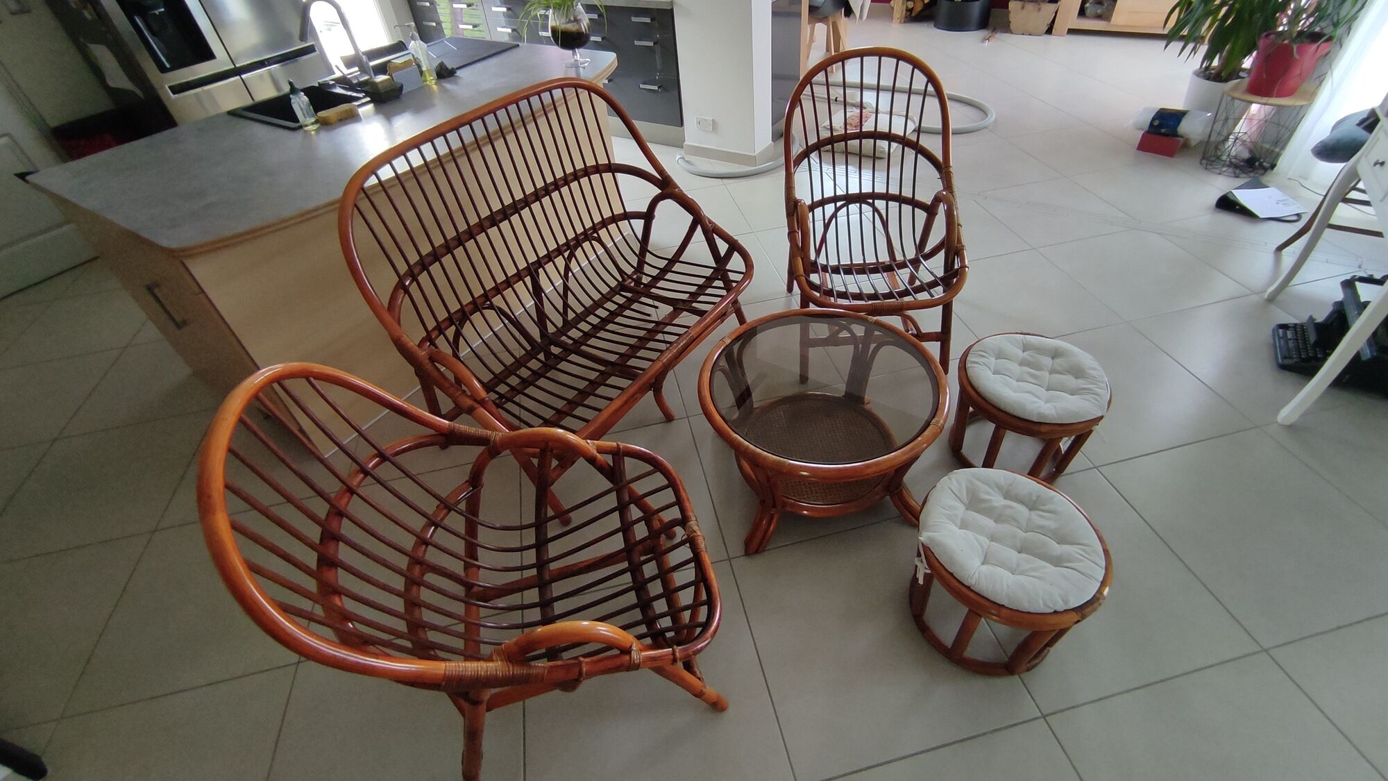 Sofa armchairs and coffee table in vintage rattan of six pieces