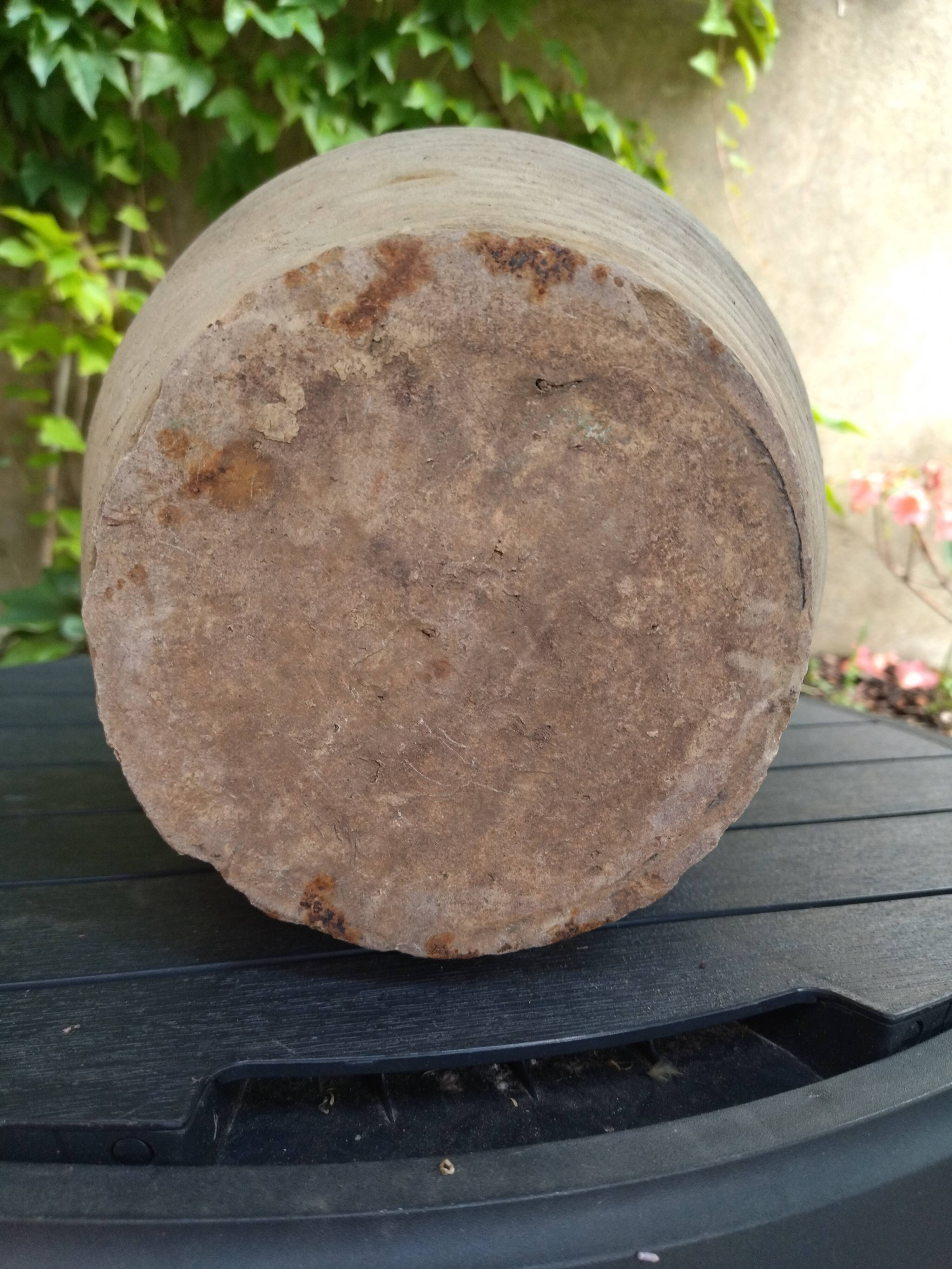 Ancient sandstone jar with two handles