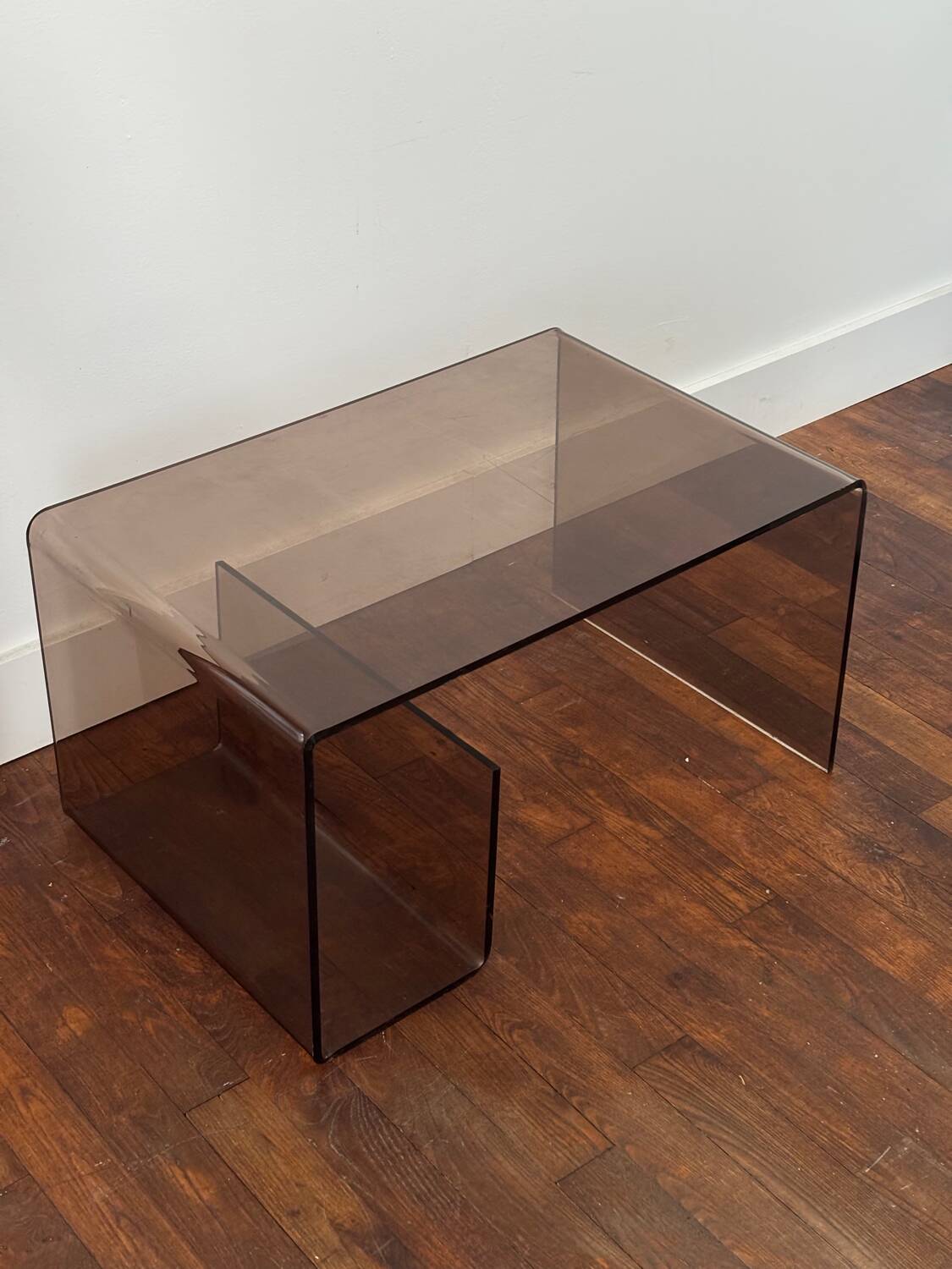 Smoked plexiglass coffee table