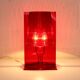 Red plastic Kartell table lamp - model Take - design by Ferruccio Laviani