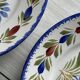 2 decorative plates in Quimper earthenware, signed HB Henriot.