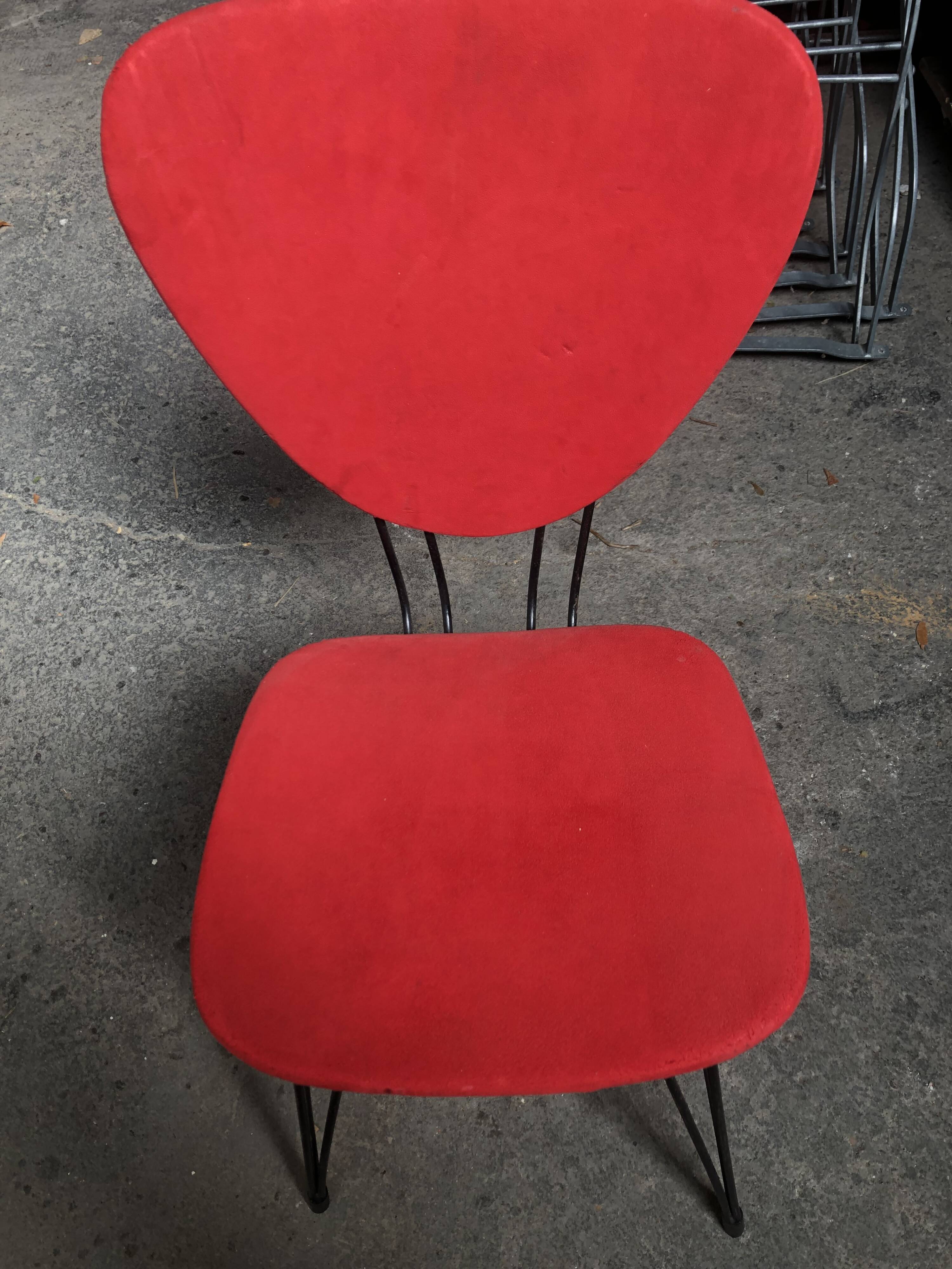 Chaises rouges vintage années 60